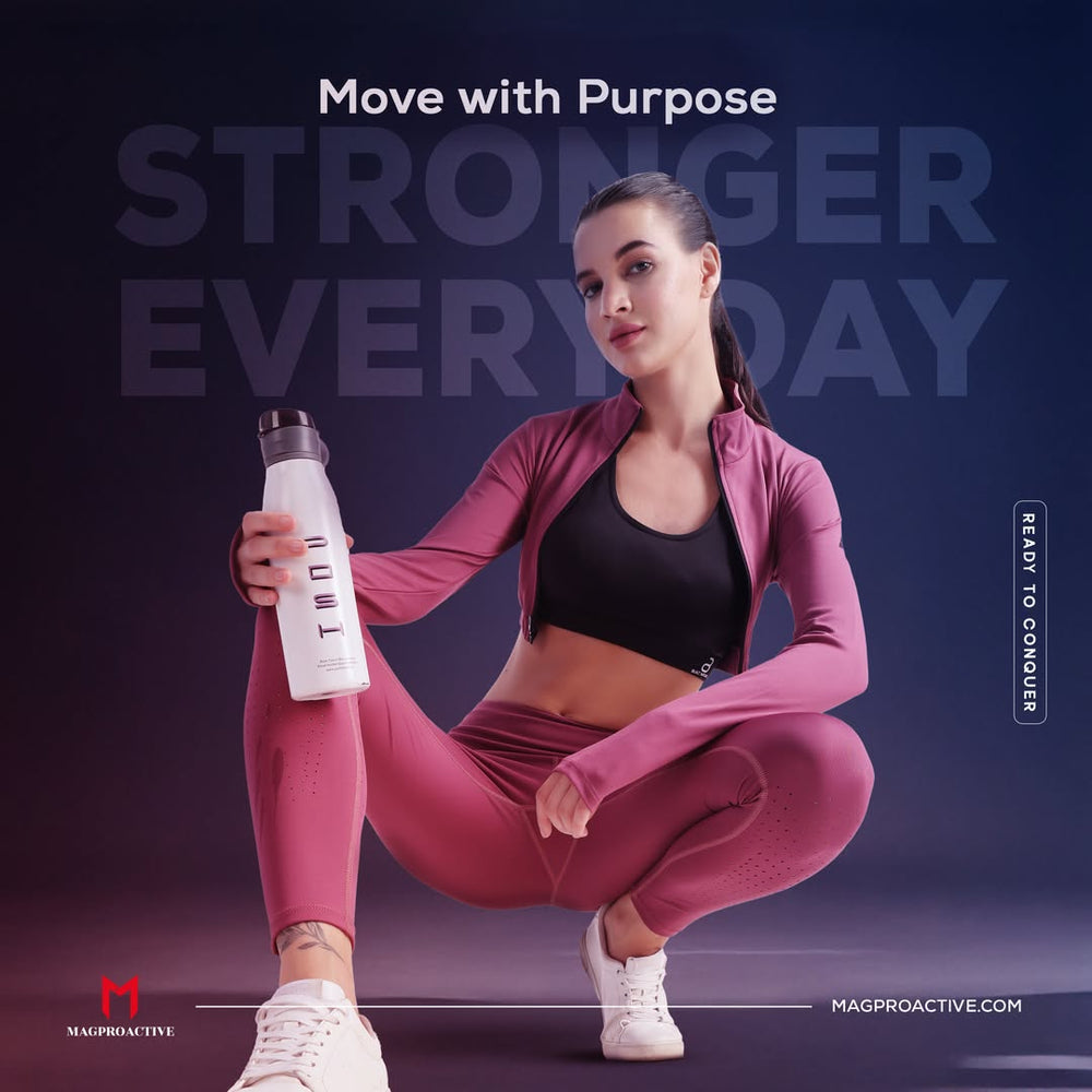 Woman in athletic wear holding a water bottle with motivational text on a dark background